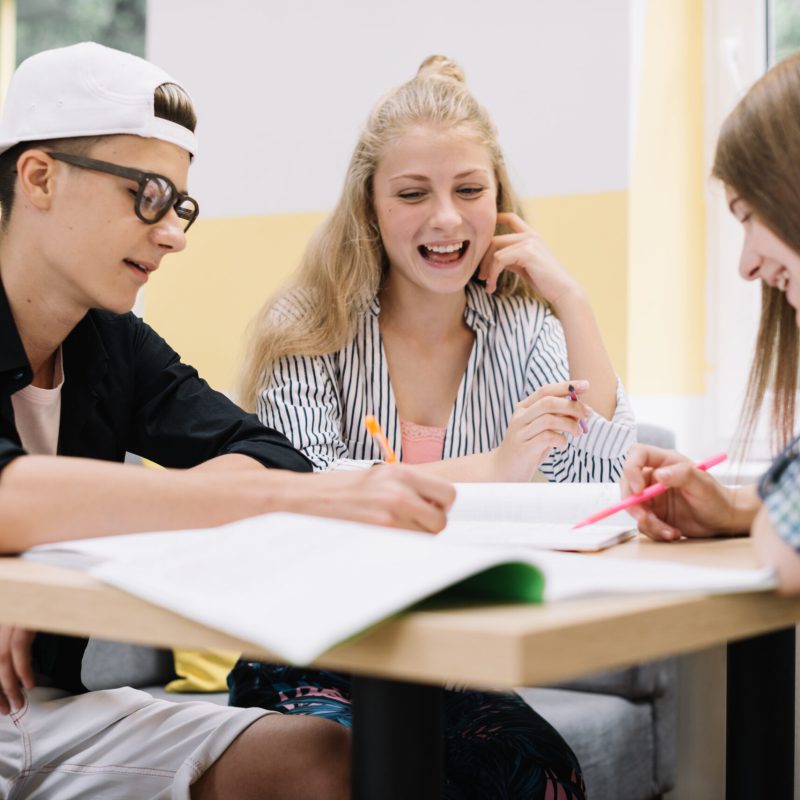 school-boy-girls-desk-with-books